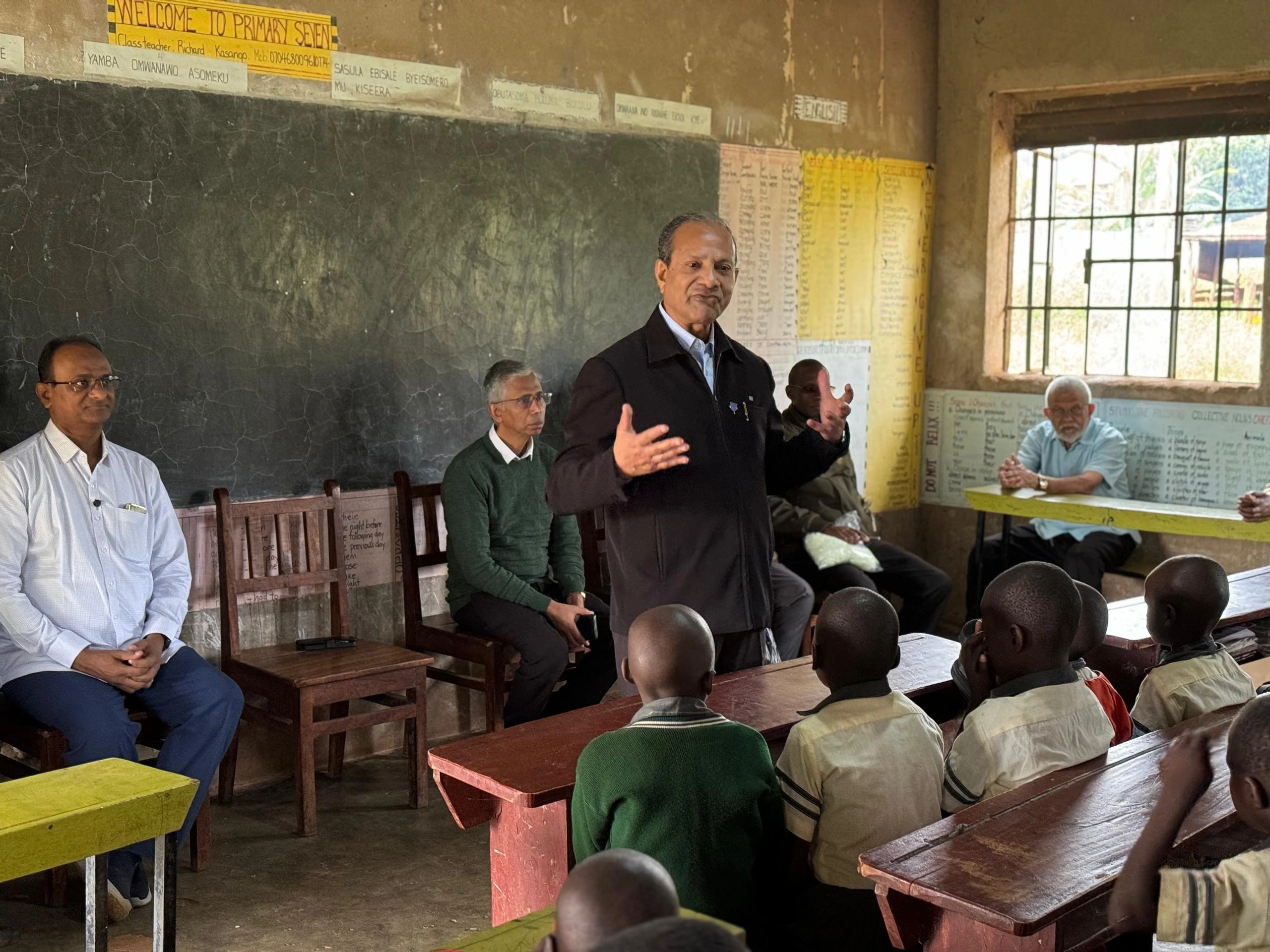 Br. John Kallarackal, Superior General with St.Kizito Nursery & Primary School students